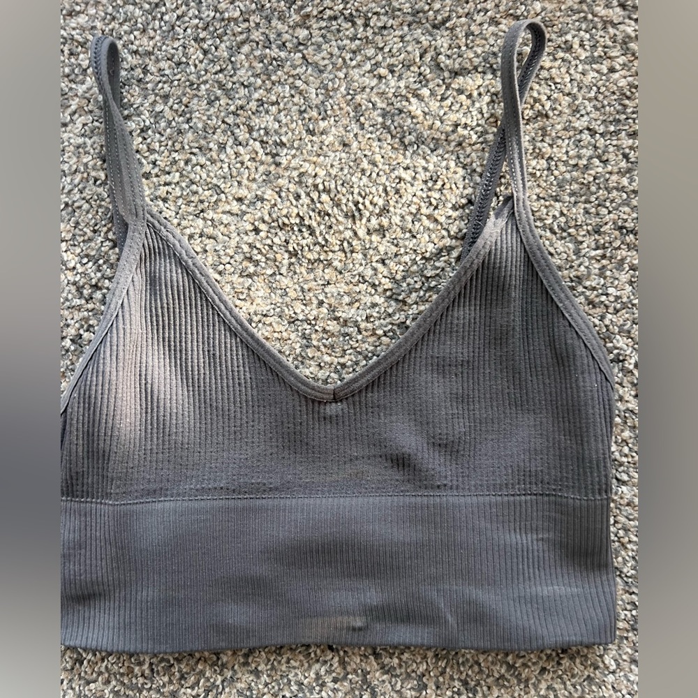 Out from under tank/bra